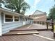 Backyard deck featuring space for entertaining, sun shades, and access to large backyard at 1872 Canmont Ne Dr, Brookhaven, GA 30319