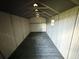 The inside of a storage shed with lighting, offering ample space for organizing your items at 1872 Canmont Ne Dr, Brookhaven, GA 30319