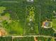 An aerial view of the 8-acre lot showing location of buildings and property lines at 220 Gamble Dr, Carrollton, GA 30116