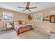 Comfortable bedroom with natural light, ceiling fan, and cozy decor at 2532 Millbrook Dr, Snellville, GA 30078