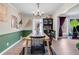 Bright and inviting dining room with stylish furniture and tasteful accents at 2532 Millbrook Dr, Snellville, GA 30078