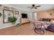 Stylish living room featuring wood floors, comfortable seating, and lots of natural light at 2532 Millbrook Dr, Snellville, GA 30078
