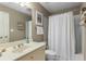 Clean bathroom featuring a shower, toilet, and vanity with sink and countertop at 290 Edwardton Ct, Roswell, GA 30076