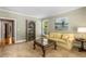 Inviting living room with plush carpet, sunny window, and stylish furnishings at 290 Edwardton Ct, Roswell, GA 30076