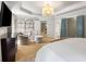 Spacious main bedroom suite with recessed lighting, a ceiling fan, and dual walk-in closets at 290 Edwardton Ct, Roswell, GA 30076