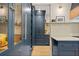 Chef's kitchen with custom cabinets and modern design elements creates a sophisticated and functional cooking space at 4435 Pemberton Cv, Johns Creek, GA 30022