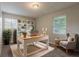 Serene home office with natural light, built-in shelving, a desk, and comfortable seating at 4748 Carson Sw Pass, Atlanta, GA 30331