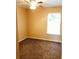 This is a simple bedroom with a ceiling fan and a window bringing in natural light at 301 Brookview Dr, Riverdale, GA 30274