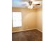 Comfortable bedroom featuring carpeted flooring and a window for natural light at 301 Brookview Dr, Riverdale, GA 30274