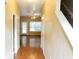 Inviting foyer leads into an open-concept living area with hardwood floors and a staircase on the right at 301 Brookview Dr, Riverdale, GA 30274