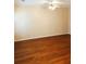 Spacious living room with hardwood floors and natural light at 301 Brookview Dr, Riverdale, GA 30274