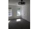 Well-lit bedroom with neutral carpet, ceiling fan, and double door closet at 3186 Kingswood Gln, Decatur, GA 30034