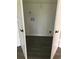 Bright laundry room featuring washer and dryer hookups, wood look flooring, and white walls at 3186 Kingswood Gln, Decatur, GA 30034