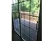 Sliding glass doors provide access to a private wooden deck and wooded backyard at 3186 Kingswood Gln, Decatur, GA 30034