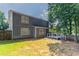 Exterior of home featuring an outdoor wooden deck and mature trees, and grass at 4968 Windsor Downs Ln, Decatur, GA 30035