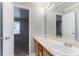 Bathroom with double vanity, and large mirror at 4968 Windsor Downs Ln, Decatur, GA 30035
