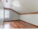 Bonus room with wooden trim, hardwood floors, and a window at 4968 Windsor Downs Ln, Decatur, GA 30035