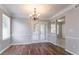 Bright dining area with French doors and wood flooring at 4968 Windsor Downs Ln, Decatur, GA 30035