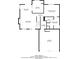 Main floor plan showing the kitchen, dining room, living room, garage, and primary bedroom at 4968 Windsor Downs Ln, Decatur, GA 30035