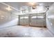 Spacious garage with two door garage waiting to be personalized and used at 4968 Windsor Downs Ln, Decatur, GA 30035