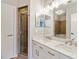 Bathroom with double vanity, walk-in shower, neutral decor, and tile flooring at 898 Oak Sw St # 3228, Atlanta, GA 30310