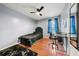 Charming bedroom with wood floors, a ceiling fan, and a view to outside at 2706 Del Ridge Dr, Douglasville, GA 30135
