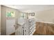 Entryway showcasing hardwood floors, natural light, and a white front door at 2706 Del Ridge Dr, Douglasville, GA 30135