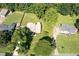 Aerial shot of a charming home and a spacious, tree-lined backyard at 2880 Brett Nw Cir, Acworth, GA 30101