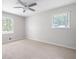 Bedroom showcasing two windows that provide lots of natural light and a ceiling fan at 2880 Brett Nw Cir, Acworth, GA 30101