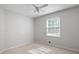 Neutral bedroom featuring carpet and a ceiling fan plus natural light from a window at 2880 Brett Nw Cir, Acworth, GA 30101