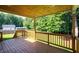 Outdoor deck and covered patio area overlooking the backyard with privacy at 2880 Brett Nw Cir, Acworth, GA 30101