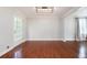 Spacious, sun-filled dining area with hardwood floors, light walls, and a door to the outside at 2880 Brett Nw Cir, Acworth, GA 30101