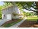 Charming two-story home with grey siding, black shutters, and an attached garage at 2880 Brett Nw Cir, Acworth, GA 30101