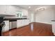 Lovely kitchen features stainless steel dishwasher, granite counters and is adjacent to a casual dining area at 2880 Brett Nw Cir, Acworth, GA 30101