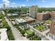 Lovely aerial view of commercial and residential buildings, parking area and the city skyline in the backdrop at 650 Glen Iris Ne Dr # 26, Atlanta, GA 30308