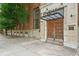 Building entrance with large double wooden doors at 650 Glen Iris Ne Dr # 26, Atlanta, GA 30308