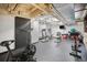 Well-equipped gym with weight machines, treadmill, elliptical trainer, and exposed ductwork at 650 Glen Iris Ne Dr # 26, Atlanta, GA 30308