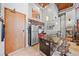 Chic kitchen featuring stainless steel appliances, red accents, and an island with counter seating at 650 Glen Iris Ne Dr # 26, Atlanta, GA 30308
