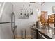 Modern kitchen with stainless steel appliances and a black countertop at 650 Glen Iris Ne Dr # 26, Atlanta, GA 30308