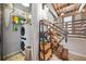 Laundry room with stacked washer and dryer and an adjacent staircase at 650 Glen Iris Ne Dr # 26, Atlanta, GA 30308