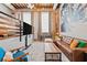 Bright living space featuring a unique raised sleeping area and exposed ceiling at 650 Glen Iris Ne Dr # 26, Atlanta, GA 30308