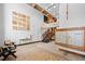 Lobby features include tile flooring, high ceilings, mailboxes, stairs, and seating with interesting artwork at 650 Glen Iris Ne Dr # 26, Atlanta, GA 30308