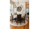 Charming dining room featuring a round table, chandelier, and hardwood floors at 730 Midway Ave, Canton, GA 30114