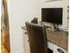 Cozy home office nook with a sleek computer setup and granite countertops at 730 Midway Ave, Canton, GA 30114