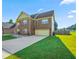 A charming two-story house with a well-maintained green lawn and a spacious driveway leading to the garage at 85 Shiver Blvd, Covington, GA 30016