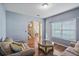 Open-concept living room with hardwood floors and views of the staircase at 85 Shiver Blvd, Covington, GA 30016