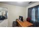 Functional home office with wooden desk and view at 85 Shiver Blvd, Covington, GA 30016