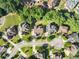 Aerial view highlighting approximate property lines amidst a lush, green neighborhood, showcasing the home's location at 2539 Sagebrush Trl, Buford, GA 30519