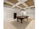 Spacious basement featuring coffered ceiling, pool table, and tile floor at 2539 Sagebrush Trl, Buford, GA 30519
