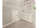 Walk-in closet with custom storage with shelving and drawers and a window at 2539 Sagebrush Trl, Buford, GA 30519